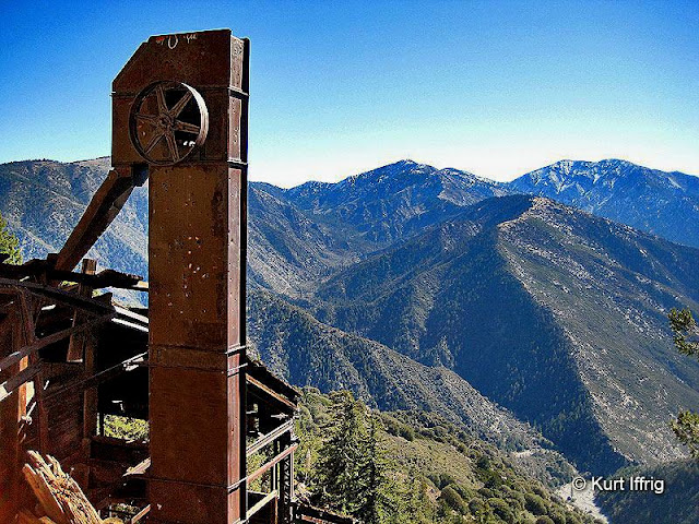 Next to Big Horn Mine's stamp mill enclosure is an old ore elevator used to move rocks into the two story hopper. This is Big Horn Mine's ore elevator, located below the upper portal to the mine.