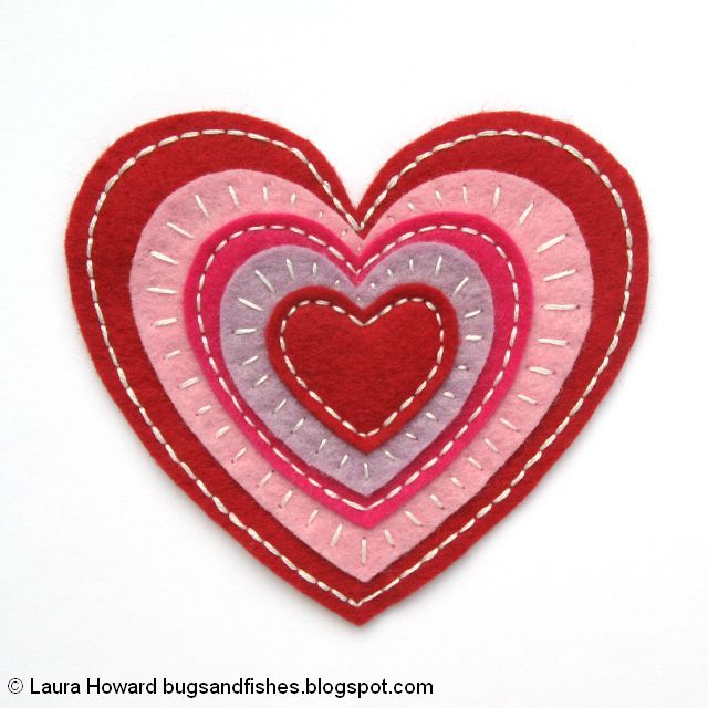 DIY Valentine's Day Yarn and Felt Heart Wreath Tutorial Embroidered felt heart for Valentine's Day