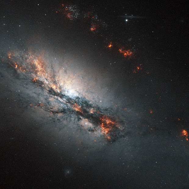 Starburst Barred Spiral Galaxy NGC 2146 imaged by Hubble