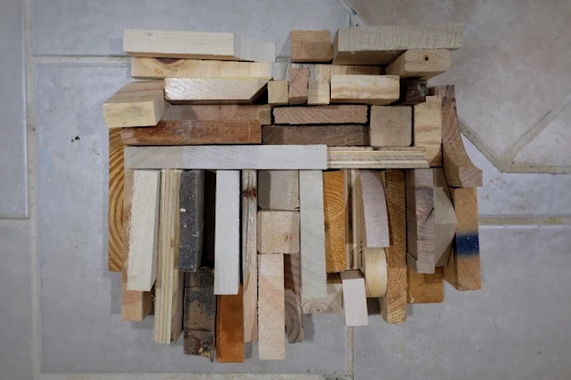 arranging scrap wood