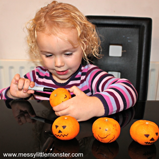 Easy and healthy Jack O Lantern Halloween Snacks for kids.  Great for parties, groups, toddlers, preschoolers and older kids. A book activity linked to the 'Five Little Pumpkins' song.