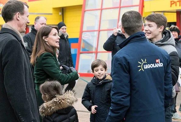 Prince Joachim, Princess Marie, Princess Athena, Prince Henrik and Prince Felix at opening of LEGOLAND Billund. Theory Oaklane green coat