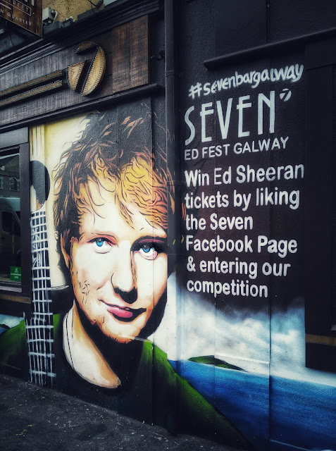 Exploring Galway city - colours and unexpected art by Annie Japaud Ed Sheeran's face on a wall in Galway