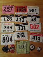 Lance Eaton's racing numbers and medals.