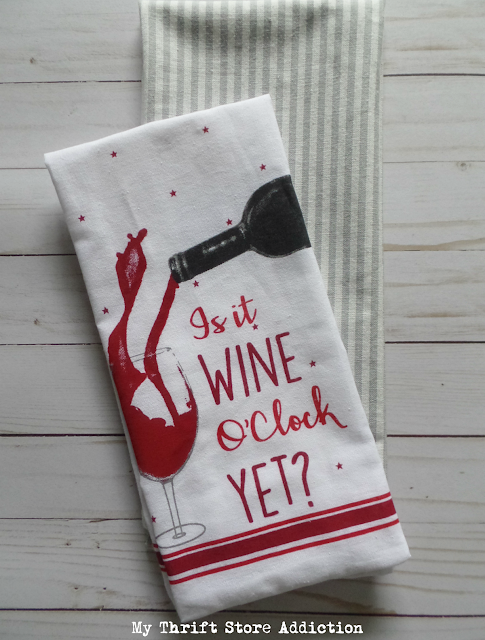 Learn how to make these fun farmhouse style stockings using dollar store dish towels! DIY Dollar store stockings