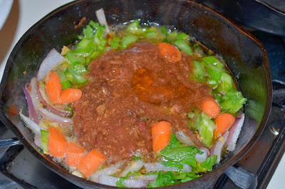 Add the carrots, celery and stock base Photo by Trisha Field