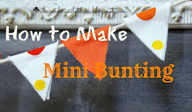 mini bunting in polka dot and solid orange fabric