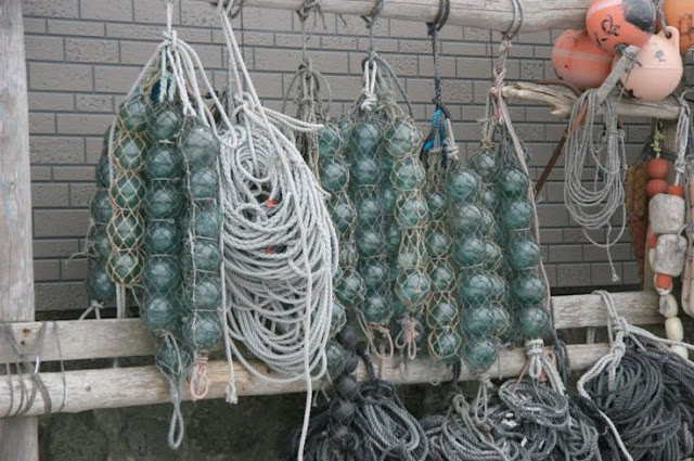 Four Authentic Used Fishing Net Floats Buoys on Rope Old Vintage Nautical Decor