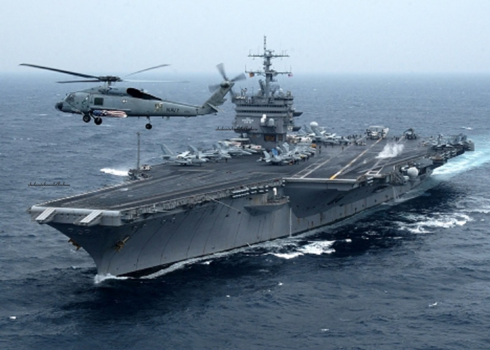 SHOLA ADEBOWALE.com: US AIRCRAFT CARRIER (USS ENTERPRISE) MAKES FINAL DEPLOYMENT