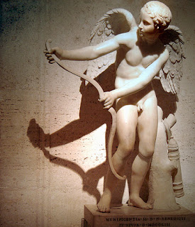 Eros stringing his bow, Roman copy after Greek original by Lysippos. Eros stringing his bow, Roman copy after Greek original by Lysippos.