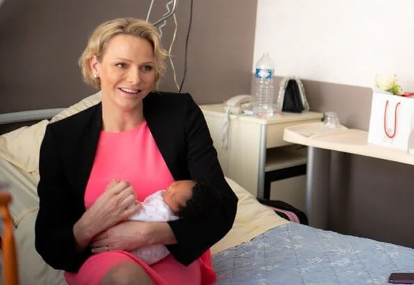 Princess Charlene wore a new asymmetric mulberry silk crepe de chine and georgette dress by Akris