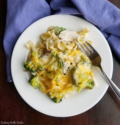 This chicken and broccoli casserole is a great way to get dinner on the table quickly. It is a perfect way to use leftover chicken or turkey as well! big serving of grandma's chicken broccoli casserole on plate with fork