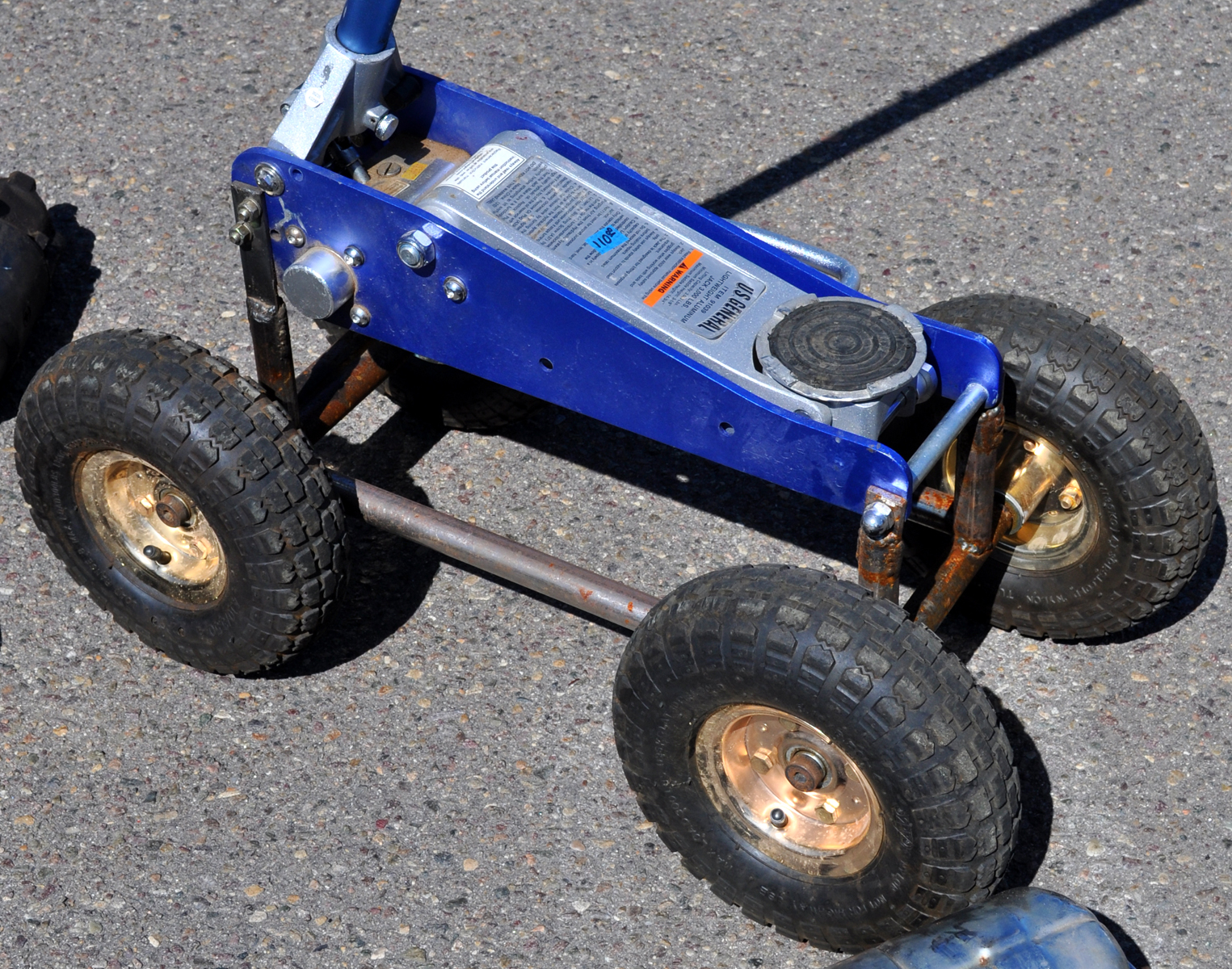 Just A Car Guy: A floor jack on knobby tires... for off road tire changes?