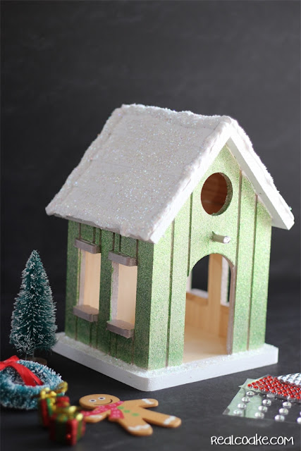 A DIY Christmas Craft to make a cute wood Gingerbread House from realcoake.com