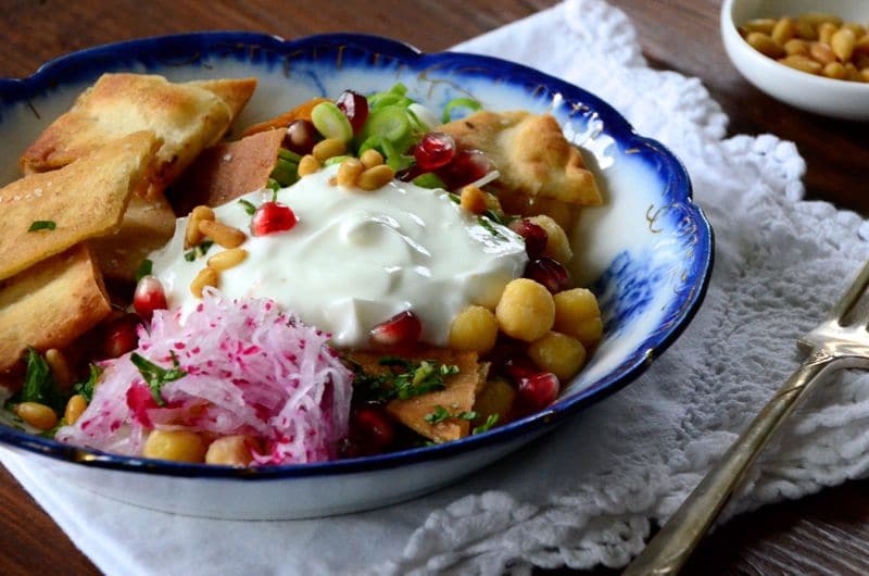 Lebanese Fattah Chickpeas, pita chips, and labneh with garnishes