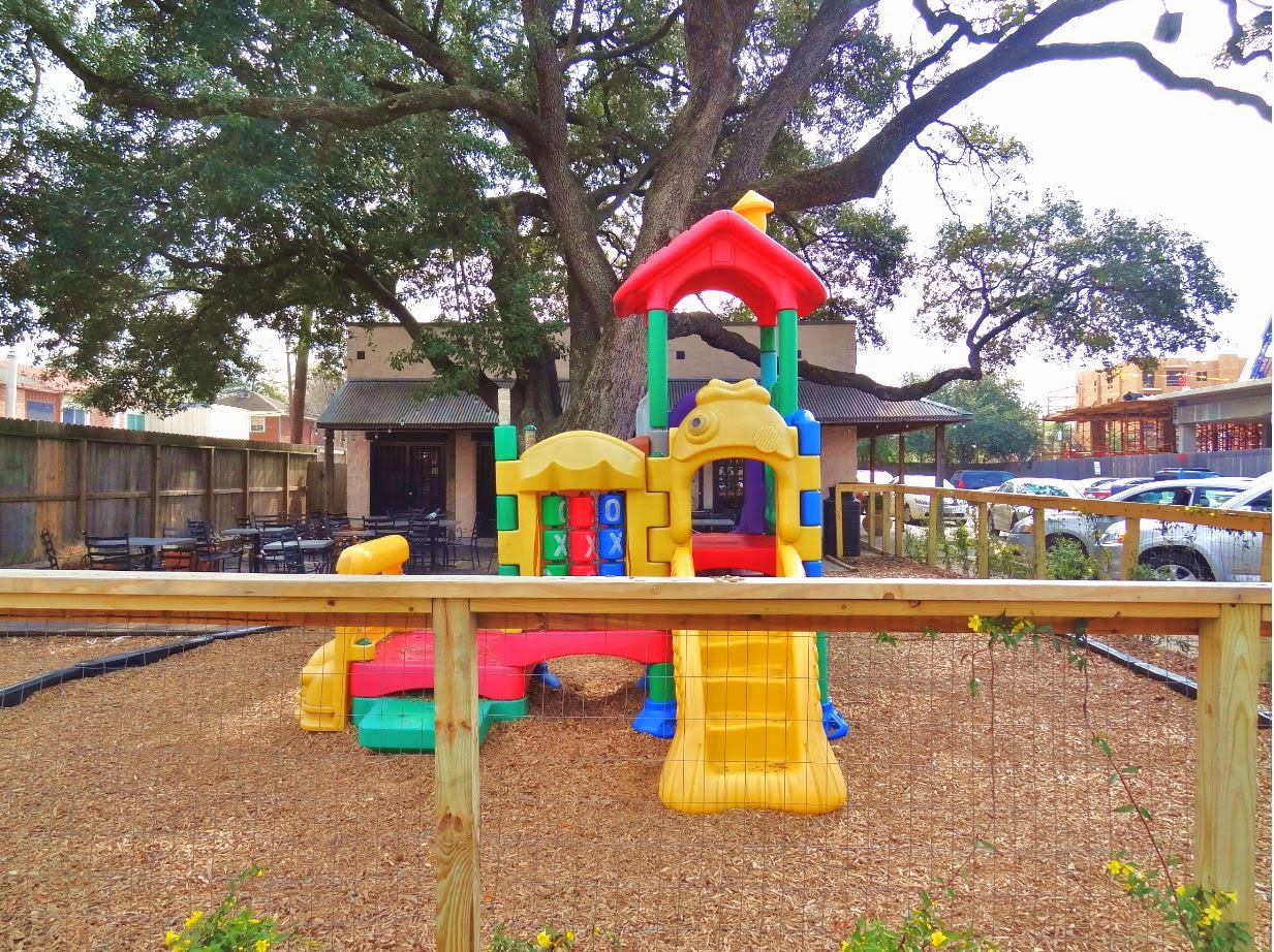 Mission Burrito children's playground in front of restaurant at West Alabama location Picture of Mission Burrito playground in front of restaurant, which has since changed its name
