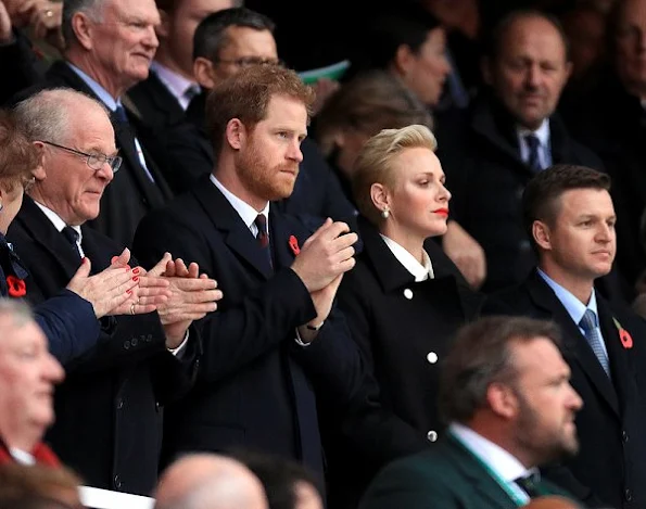Prince Harry and Princess Charlene watched the rugby match, Princess Charlene style wore coat