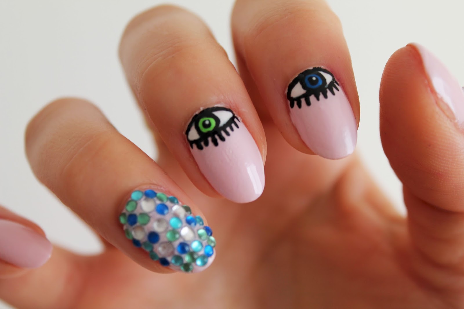 6. Pink and Green Evil Eye Nail Design - wide 10