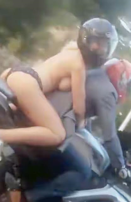 00 Woman is filmed riding on a bike dressed in just her panties and a pair of trainers