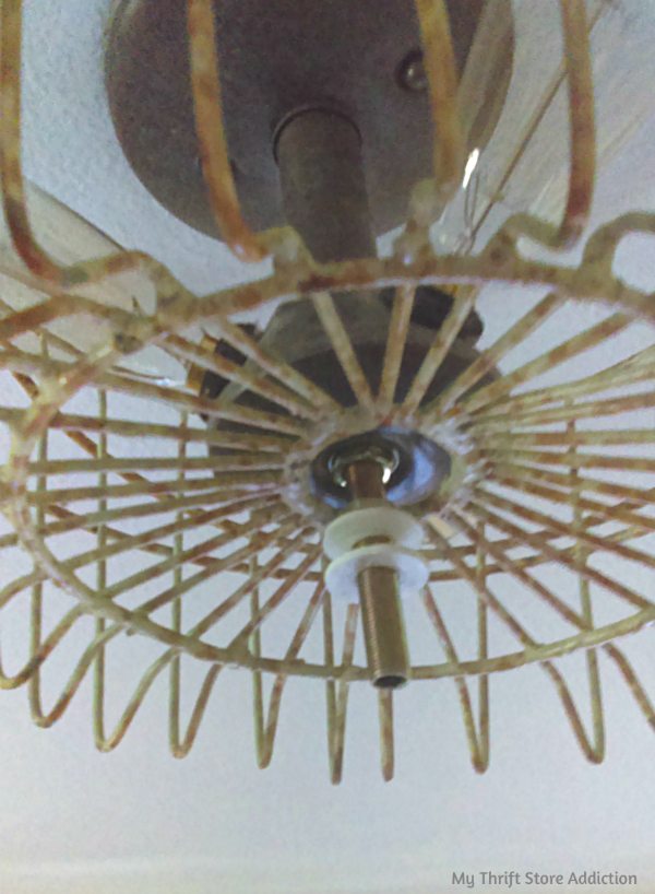 How to give a dated ceiling light an instant vintage farmhouse upgrade without changing the entire fixture! DIY farmhouse light fixture update