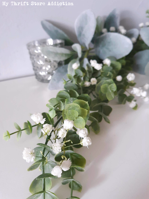 Check out my winter white mantel and gallery wall inspired by holiday clearance finds plus inspiration from 16 bloggers on the Cozy Winter Homes blog hop! Cozy winter homes mantel and gallery wall