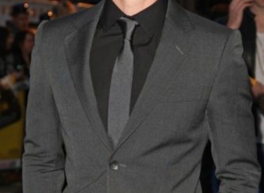 dark grey blazer with black shirt