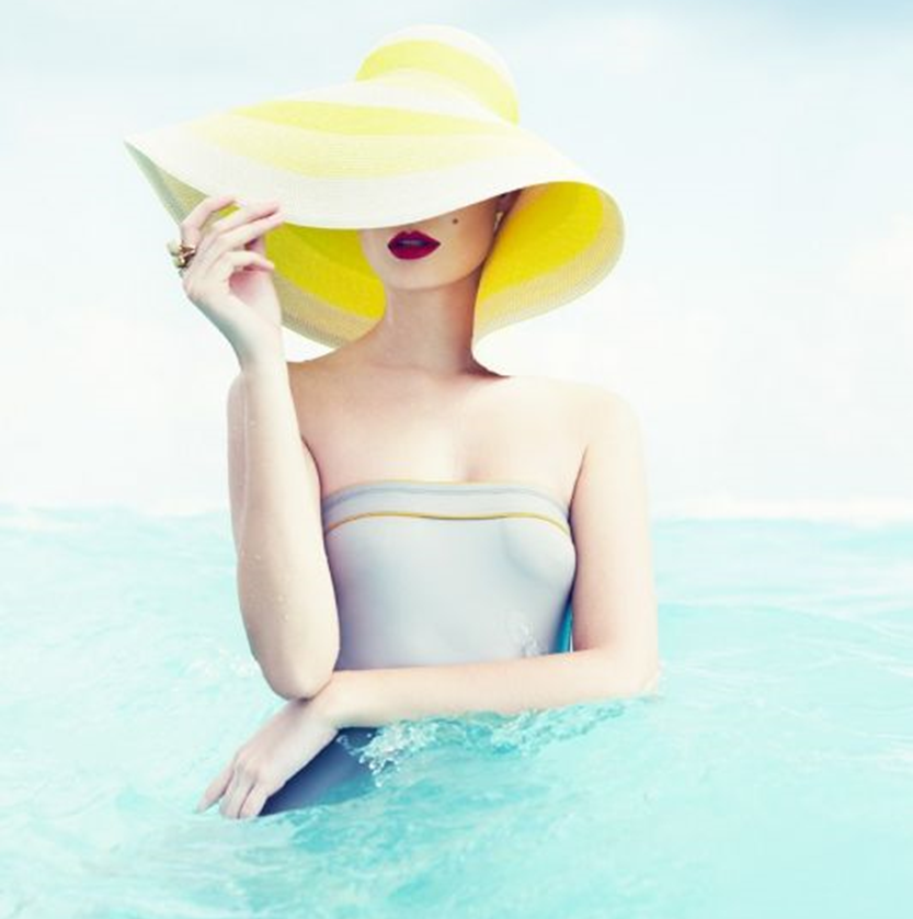 There's nothing more glamorous than a big hat and a red lip. Aside from beautiful jewels of course!