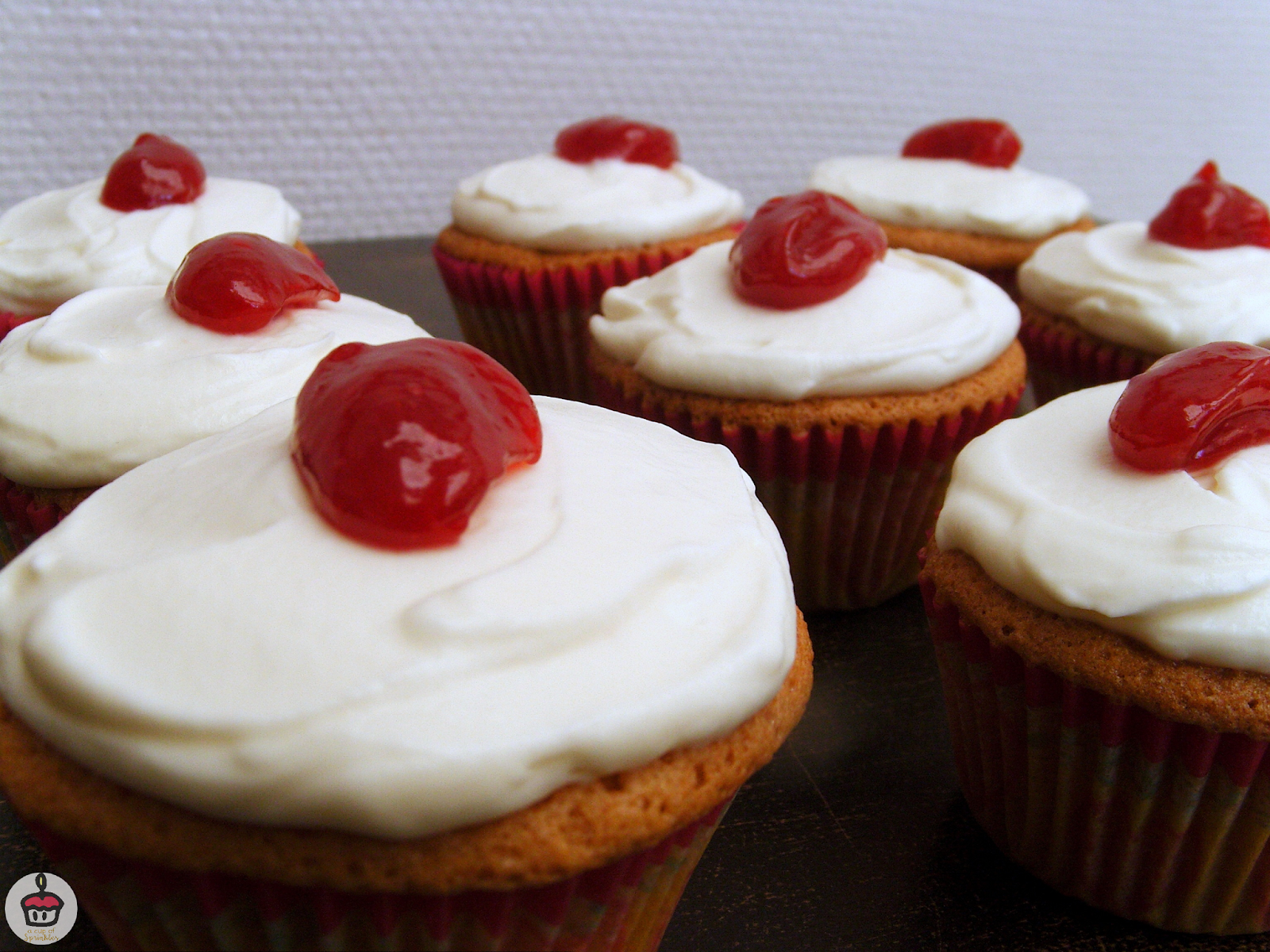 Raspberry Mascarpone Cupcakes These vanilla cupcakes have a delicous raspberry filling and a light and fluffy mascarpone frosting.