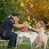Fitzone"Little girl has tea party with officer who saved her life"
