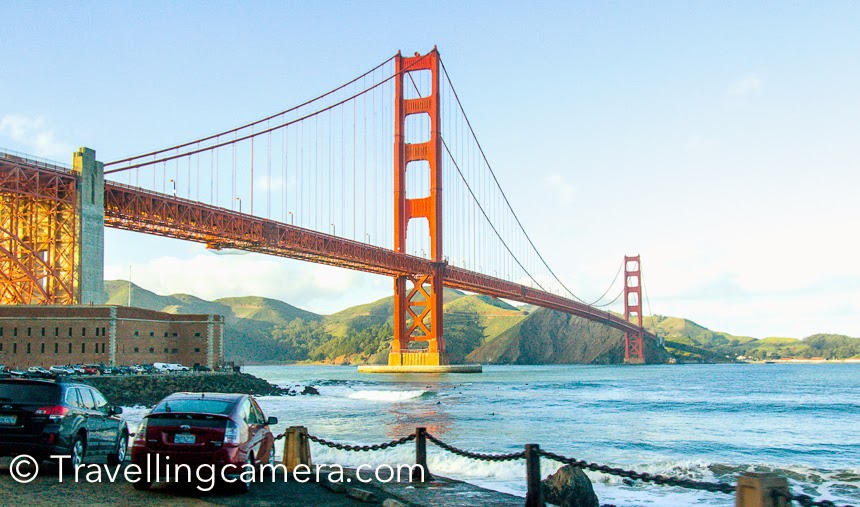 Golden Gate Bridge over which connects San Francisco with Pacific ocean is one of the main places to explore in San Francisco. I was there in 2013 and some of the office friends planned a full day Photo Walk around San Francisco. During this Photo-Walk we crossed this bridge many times and went around various places which offer some of the amazing views of the bridge. This Photo Journey shares some of the photographs clicked during this Photo-Walk.The Golden Gate Bridge is a suspension bridge links the U.S.  city of San Francisco, on the northern tip of the San Francisco Peninsula , to Marin County , bridging both U.S. Route 101  and California State Route 1  across the strait.Golden Gate Bridge is one the seven wonders of the modern world. This magnificent bridge, perhaps San Francisco's most famous landmark which was opened in 1937 after a four-year struggle against relentless winds, fog, rock and treacherous tides.Golden Gate bridge is one of the most internationally recognized symbols of San Francisco, California, and the United States. It has also been declared one of the Wonders of the Modern World  by the American Society of Civil Engineers.We drove to a neighboring hill and enjoyed some of the brilliant views of Golden Gate Bride, Pacific Ocean and an Francisco city. Battery Spencer, Marin County.One need to cross the bridge from the San Francisco side to the Marin County side to Battery Spencer, a former military installation that protected the bridge and the bay from foreign invaders during World War II. Head through the historic army artifacts and crumbling buildings to land’s end where you’ll be able to pose in your very own snapshot of the bridge with the breathtaking background of the entire city of San Francisco behind you.Another photograph of Golden Gate Bridge from Battery Spencer, Marin County..One of the largest urban parks in the world, Golden Gate Park stretches for three miles on the western edge of San Francisco. It's huge and approximately 1000+ acres, which sounds unbelievable.Golden Gate Bridge is 1.7 miles from San Francisco to the Marin headlands. The sidewalks on Golden Gate Bridge are open during the day to pedestrians including wheelchair users and bicyclists. When I was there, I saw huge groups of cyclists enjoying their ride on Golden Gate Bridge.Fort point is another god place to click Golden Gate Bridge.  This is a place which exposes you to brilliant architecture of Golden Gate Bridge. This is another former military installation which allows everyone to feel the mist from the bay waves crashing ashore while being directly underneath the bridge. Getting here from Fisherman’s Wharf  and Pier 39 is  brisk walk and bike ride through the scenic Marina District and into the Presidio along the water’s edge. There’s parking here too, free of charge, but it can be in short supply during peak visiting hours.During the visit we went to the base of Golden Gate Bridge, where lot of surfers were enjoying the pacific waves.We spent some time around the shore and watched these surfers playing with water waves in chilling weather. We were carrying some snacks with us, so thought of having some around the ocean.If you are holding a camera I am sure that you would not want to get away from these beautiful locations which give different view/perspective of Golden Gate Bridge.This is a photograph of huge iron chains installed around the shoreline near Fort point. I clicked lot of photographs of these and would share a separate Photo Journey on that.In few weeks I will be there again and hope to bring back more beautiful memories for you all.