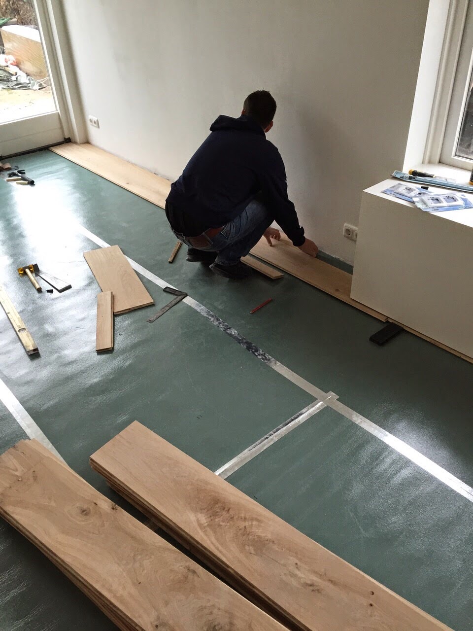 Kan je zelf een houten vloer leggen?