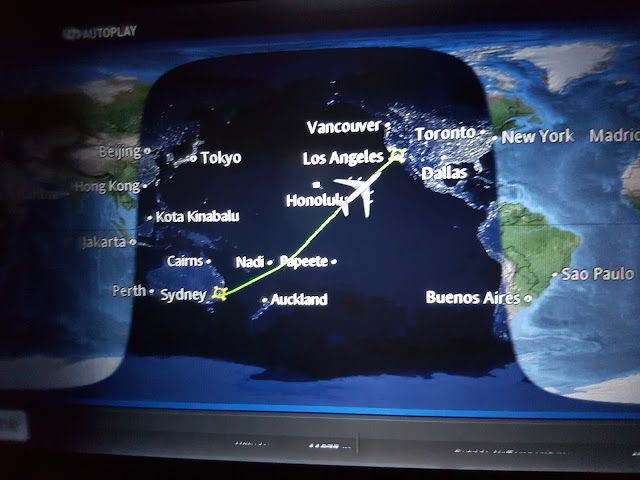 qantas flight progress sydney to lax red haired amazona NYC USA holiday