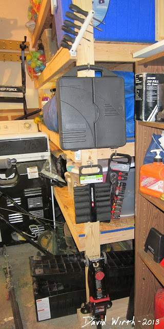 store tools in garage, hooks, shelf, air tools