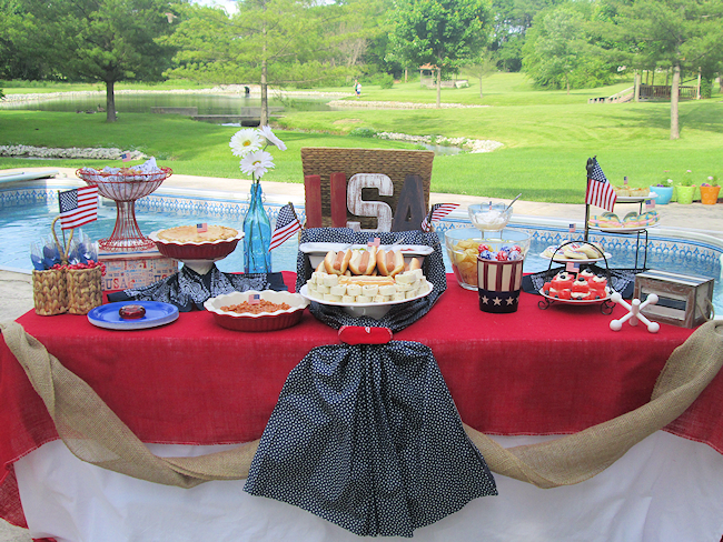 buffet table set up outside for a summer party