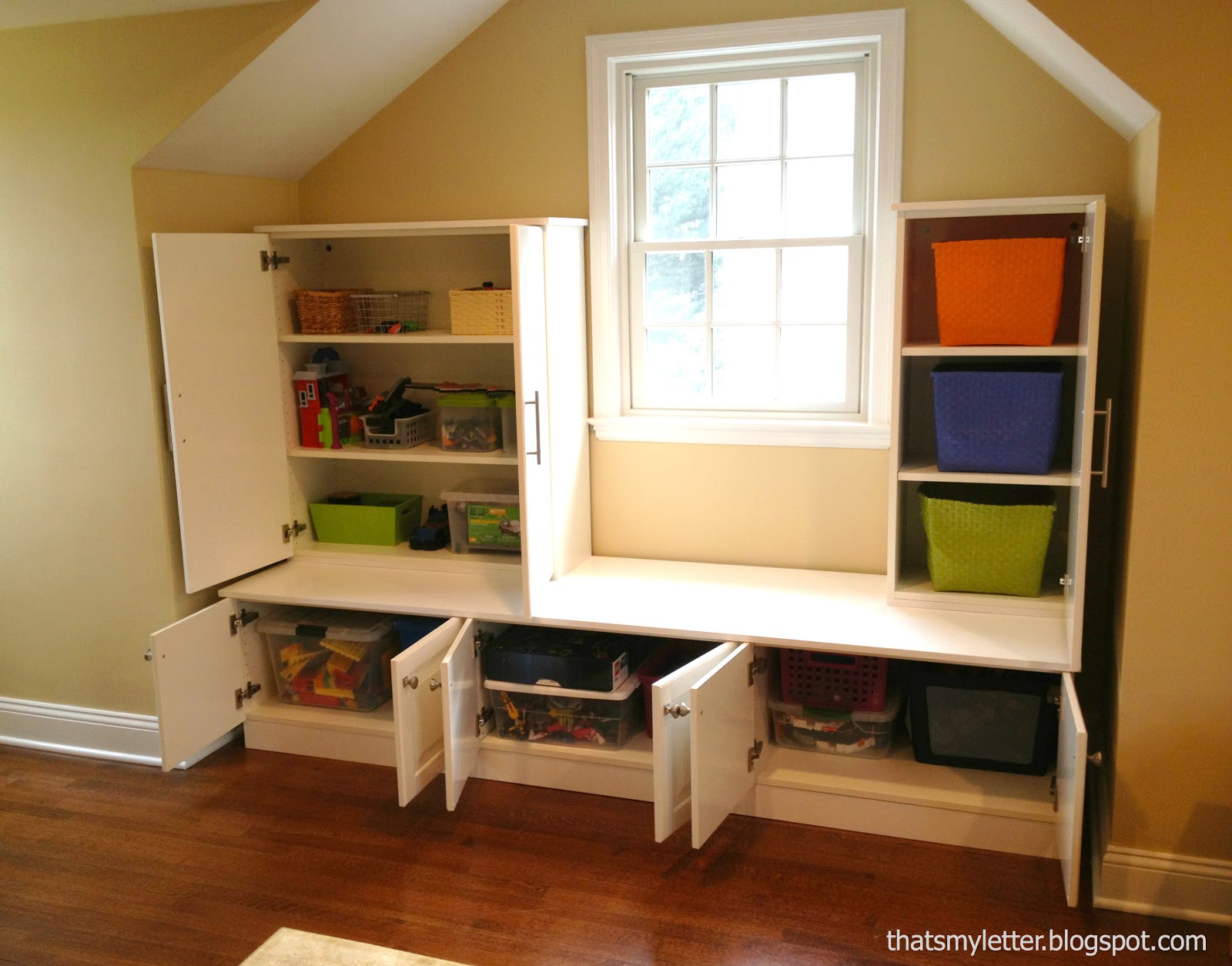 DIY Playroom Built Ins from Ikea Cabinets - Jaime Costiglio
