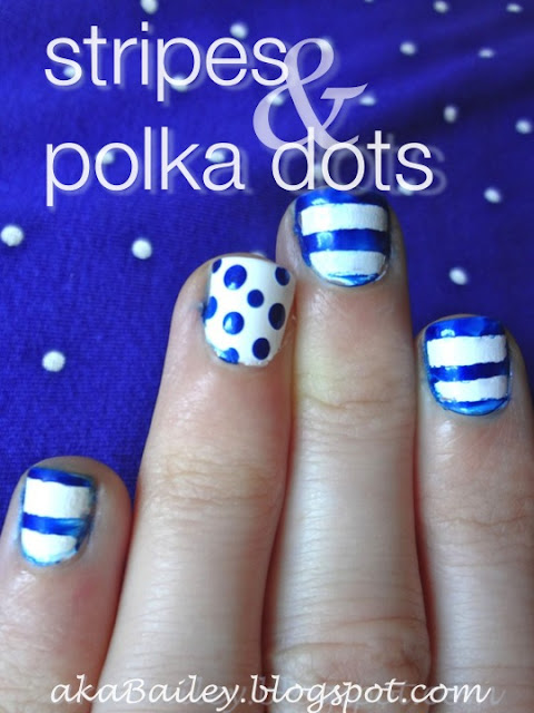white nails with blue stripes and blue polka dots