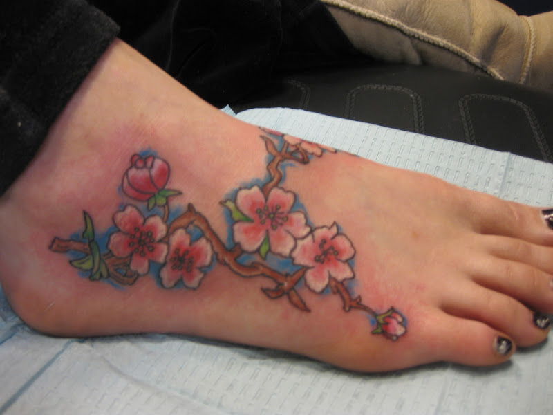 Flower Tattoos On Foot title=