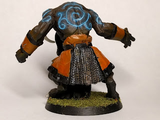 I had a lot of fun paitning the tattoos. I wasn\'t very please with the effect at first but it\'s grown on me over time. Finished Minotaur back view with glowing tattoos