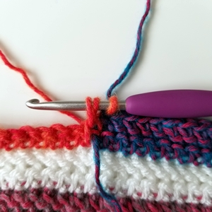 How to make a tidy color change across a row when picking up a new color from below in crochet