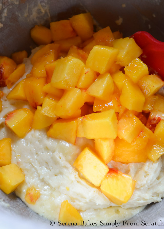Peach Crumb Muffins fold in diced peaches into batter from Serena Bakes Simply From Scratch.