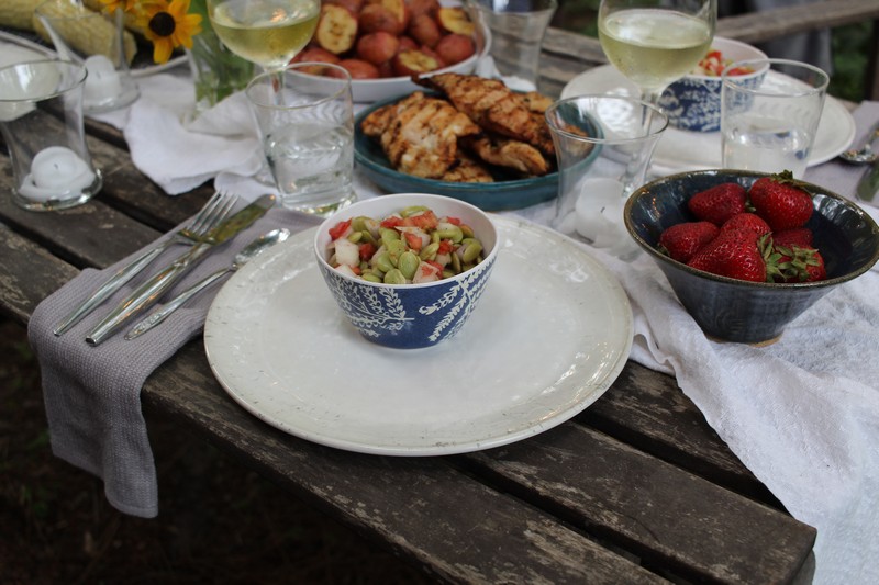 Summer dinner table with butter bean salad
