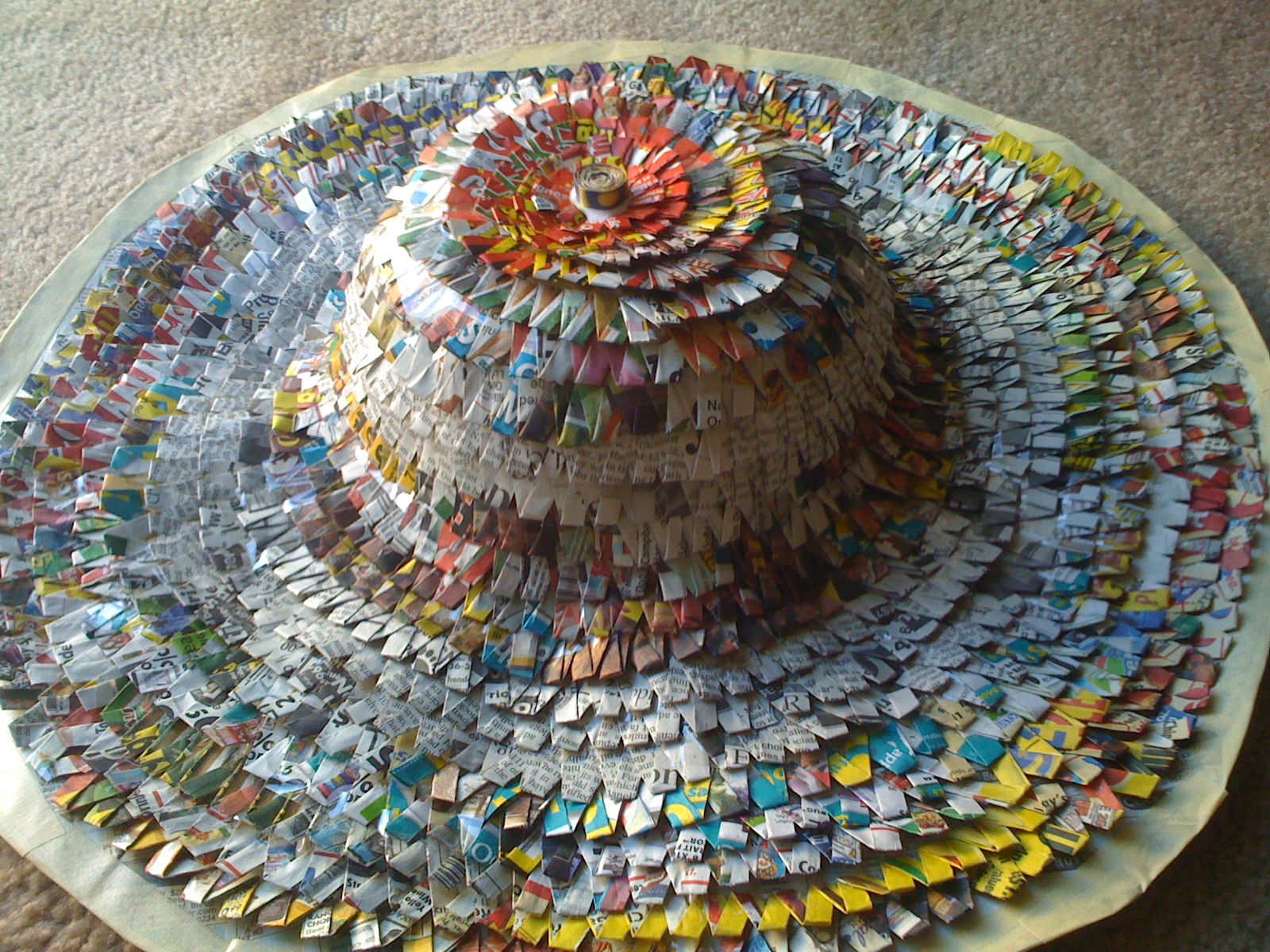 MY PASSION OF RECYCLING HAT i made out of newspapers MY UBIQUITOUS