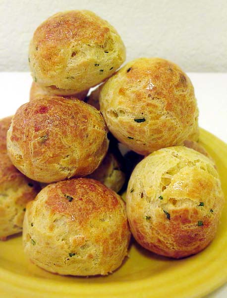 Gougeres, a.k.a. French cheese puffs. Make with gruyere or cheddar cheese. Either way, they're delicious.