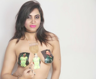 Arshi Khan Paints Shahid Afridi on her Bare Bust Arshi Khan Paints Shahid Afridi on her nuked Bare Bust
