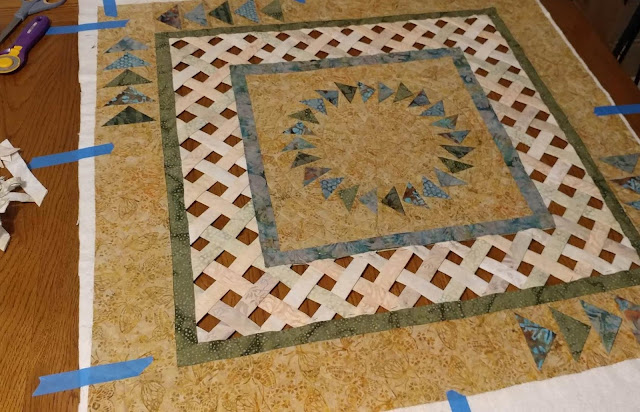 Open weave batik lattice quilt with prairie points