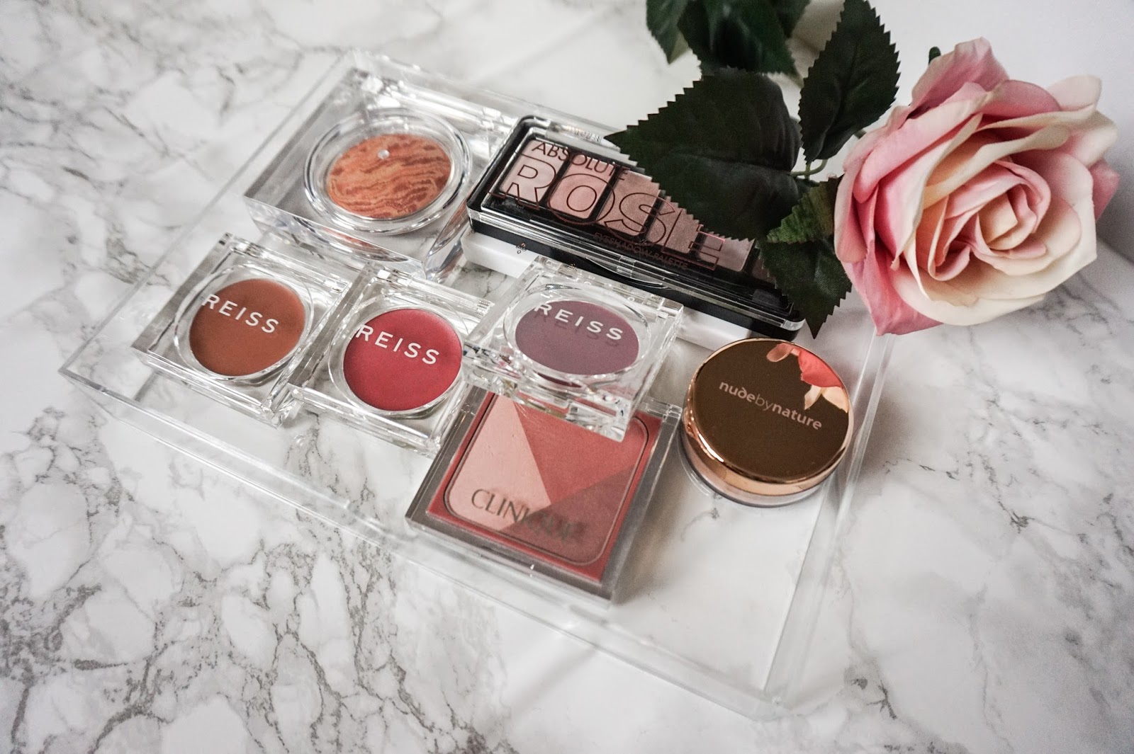 Storage tray with reiss, clinique, nude by nature and catrice makeup