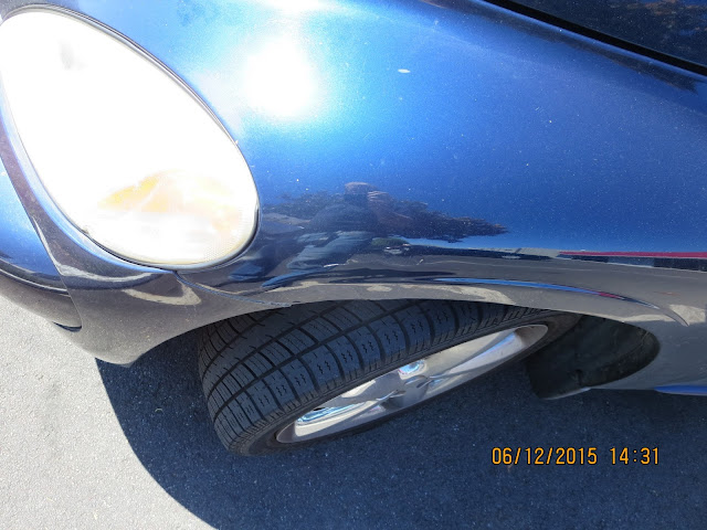 Dents on 2003 Chrysler PT Cruiser before repairs at Almost Everything Auto Body.