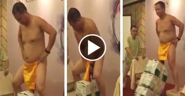 Watch Man does the most painful party trick by lifting three crates of beer effortlessly