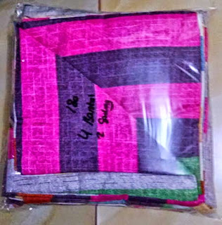 Packing sprei Contoh packing sprei dari sisi depan