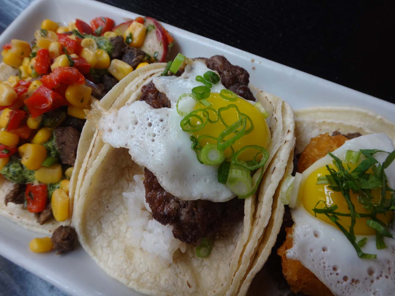 KOMODO SERVES SOME OF THE BEST ASIAN FUSION TACOS EVER, PERIOD.